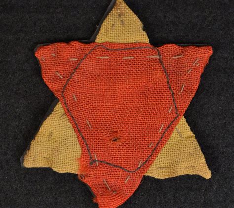 nazi metal triangle 5000 placed on houses|jewish triangle badge.